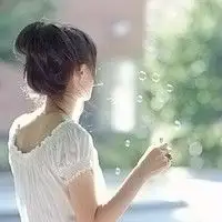 求一张伤感女生头像,头发最好是盘起来的,但一定要伤感些,当然也别太丑
